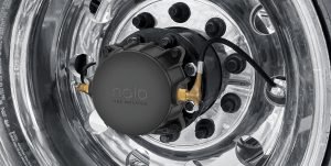 An image of a Halo Tire Inflator installed on a polished chrome wheel