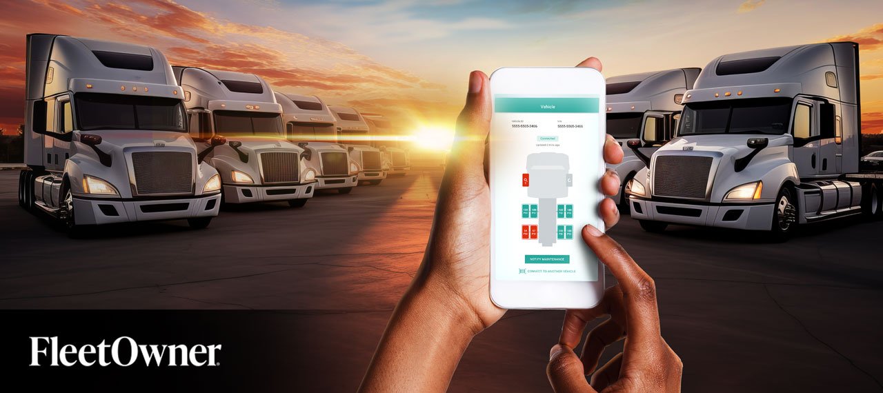 Image of person handling a phone displaying Halo predictive alerts and performing a pre trip inspection in a logistics center at the beginning of the day